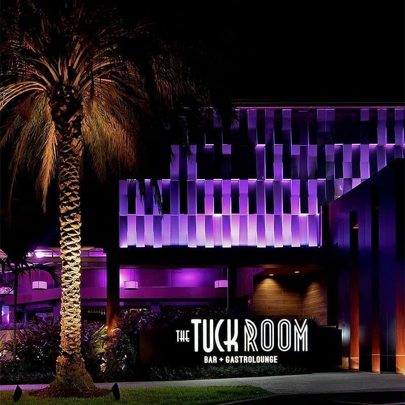 The Tuck Room exterior at night in North Miami Beach