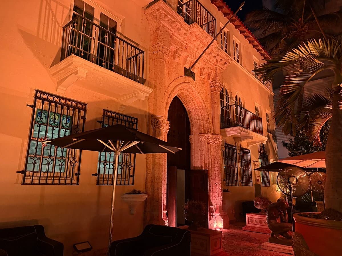 The Villa Casa Casuarina exterior at night in Miami Beach