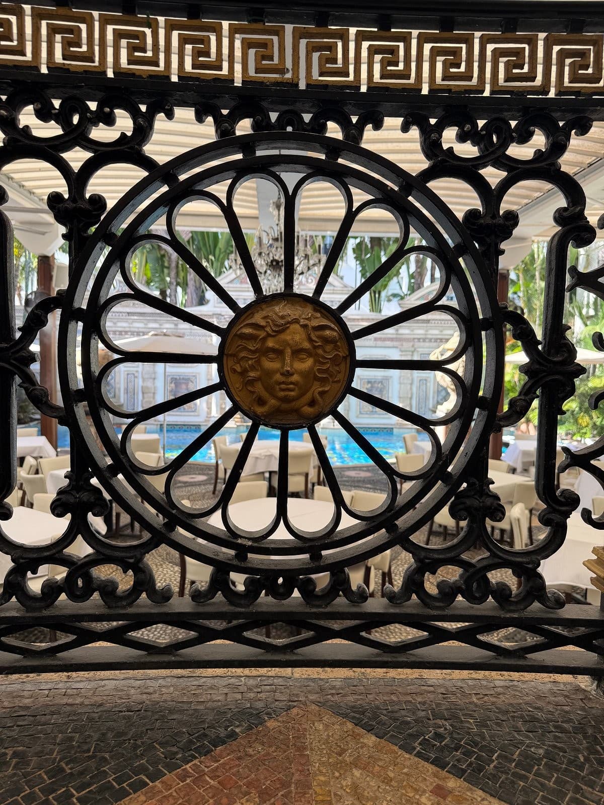 View through ornate gate at The Villa Casa Casuarina, Miami Beach