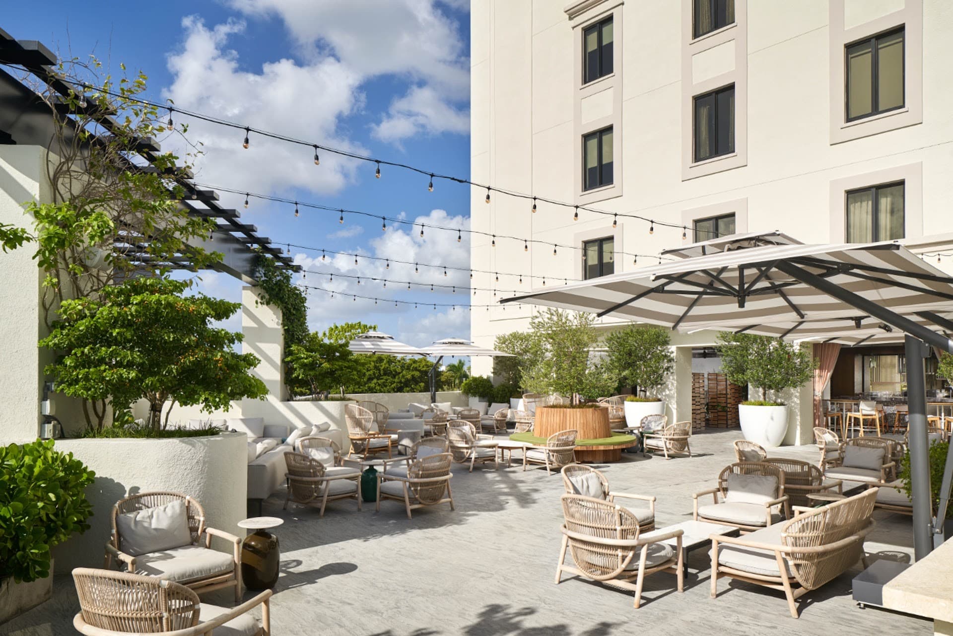 Outdoor seating area at Thesis Hotel Miami Coral Gables