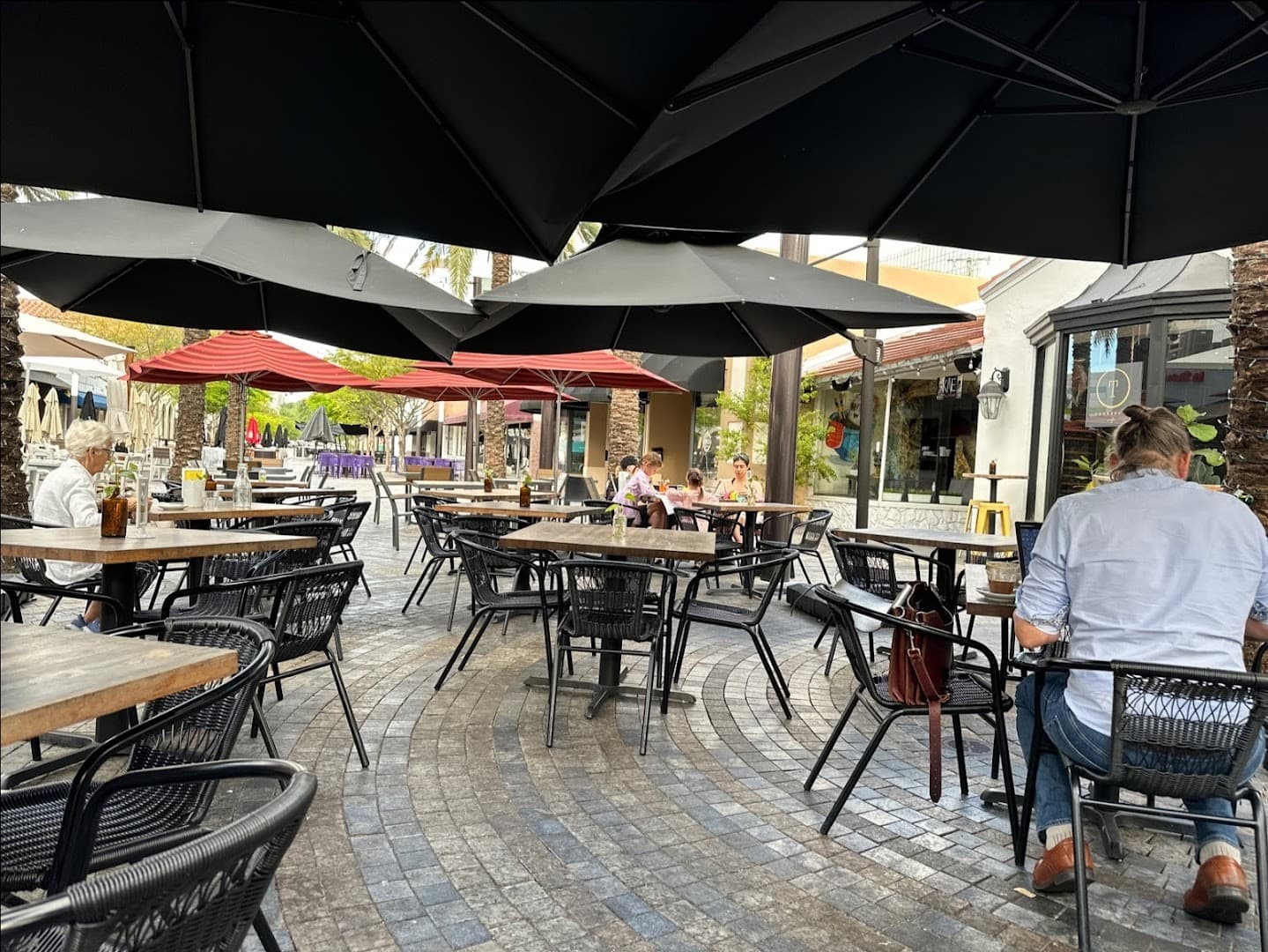 Outdoor seating at Threefold Cafe in Coral Gables