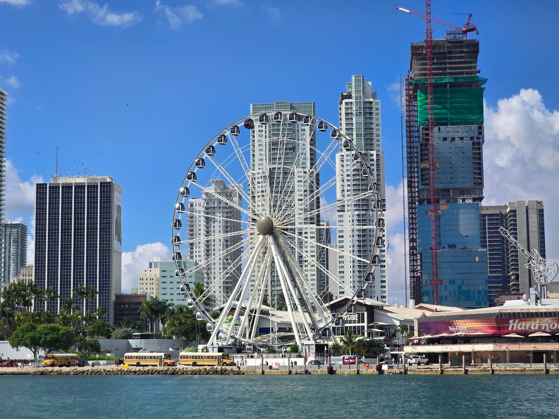 Ferris wheel and skyline view near Thriller Miami Speedboat Adventures