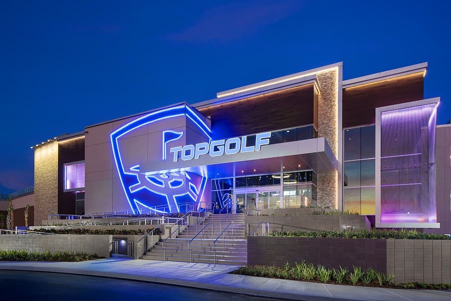 Topgolf Miami Gardens illuminated entrance at night
