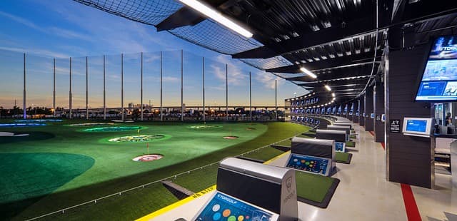 Topgolf Miami Gardens interior view with golf bays