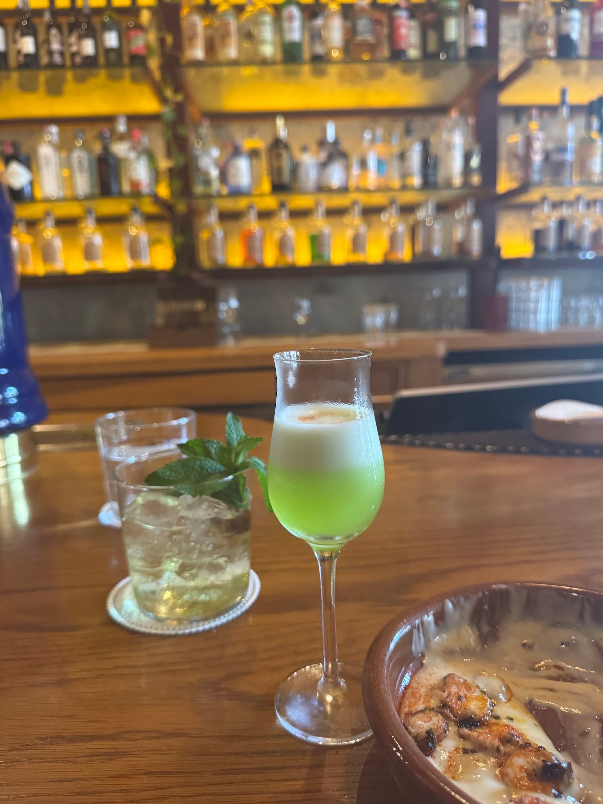 Cocktail and food at Tropezón Miami Beach