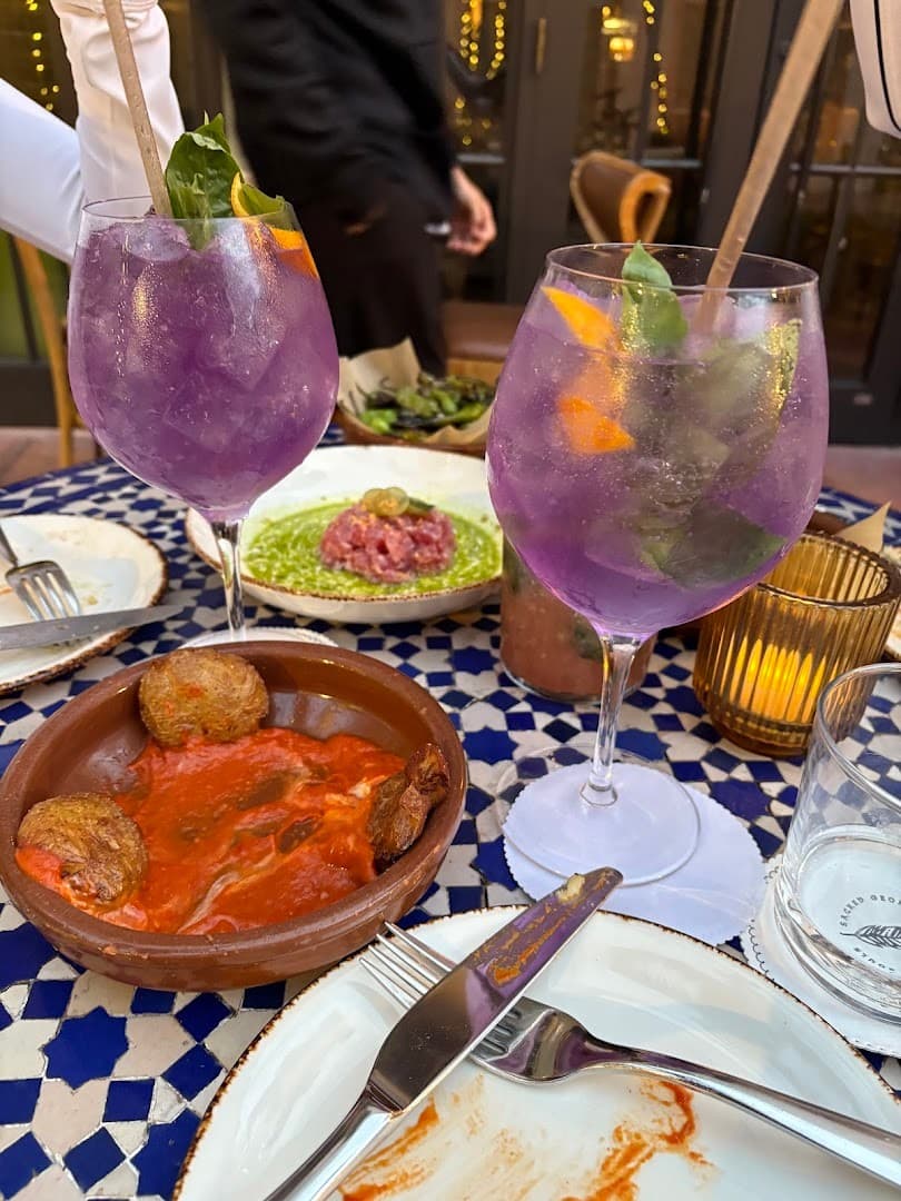 Colorful drinks and dishes at Tropezón Miami Beach