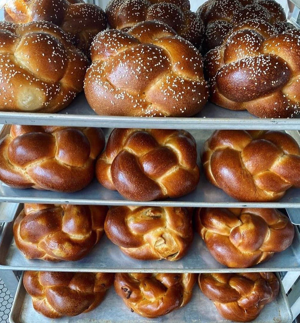 Freshly baked challah bread at True Loaf Bakery in Miami Beach