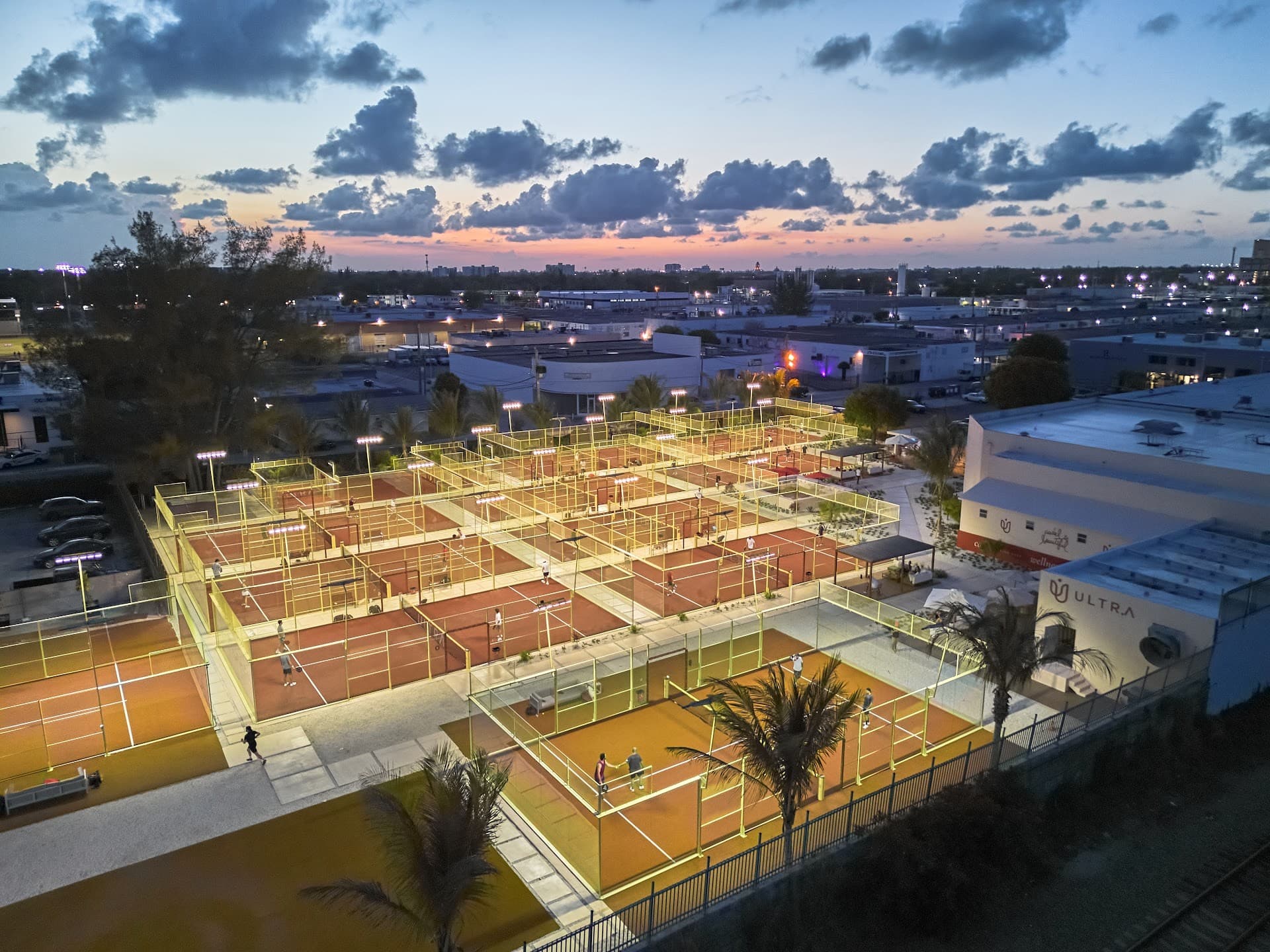 Ultra Padel Club outdoor courts in Miami at sunset