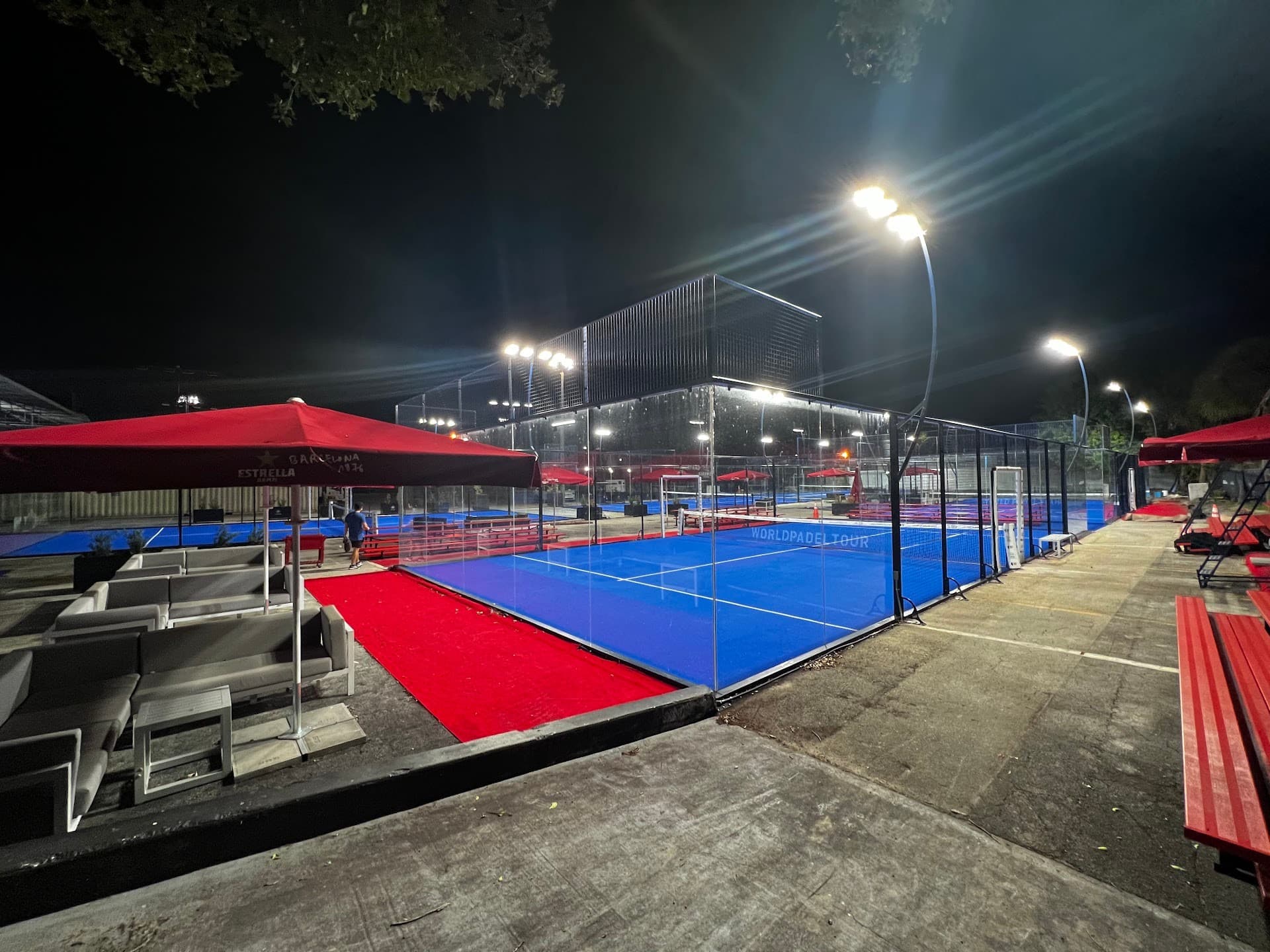 Ultra Padel Club outdoor courts at night in Miami