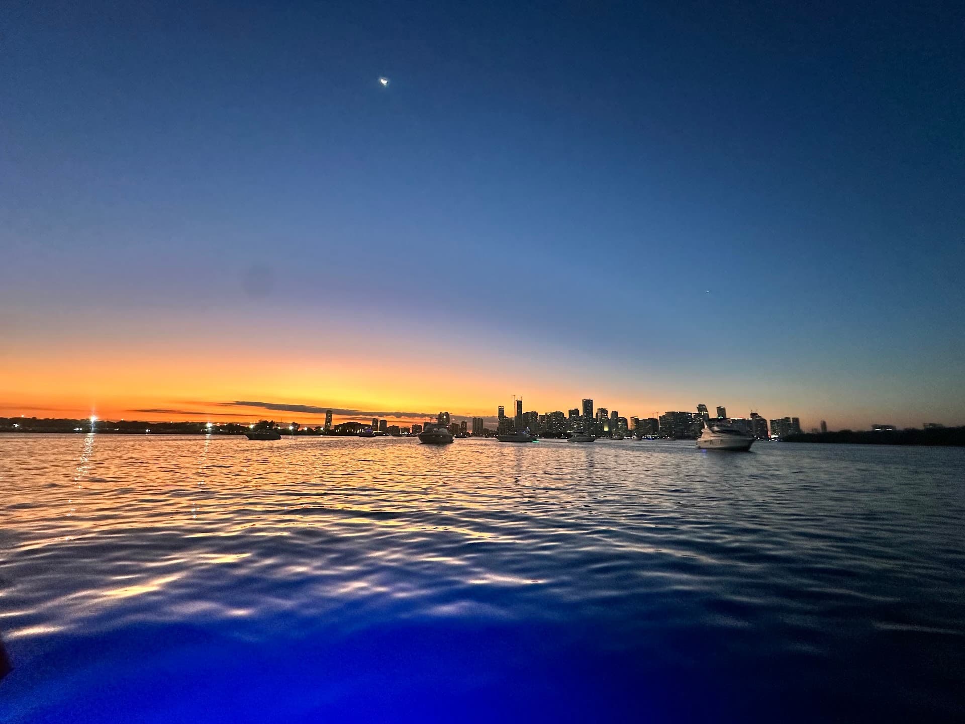 Sunset view from UNIQ Miami Yacht Charters in Miami Beach