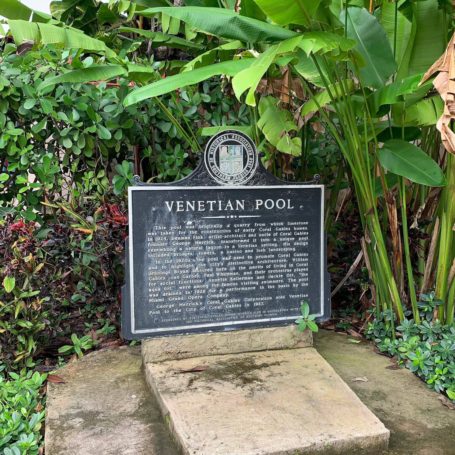 Sign detailing Venetian Pool history in Coral Gables