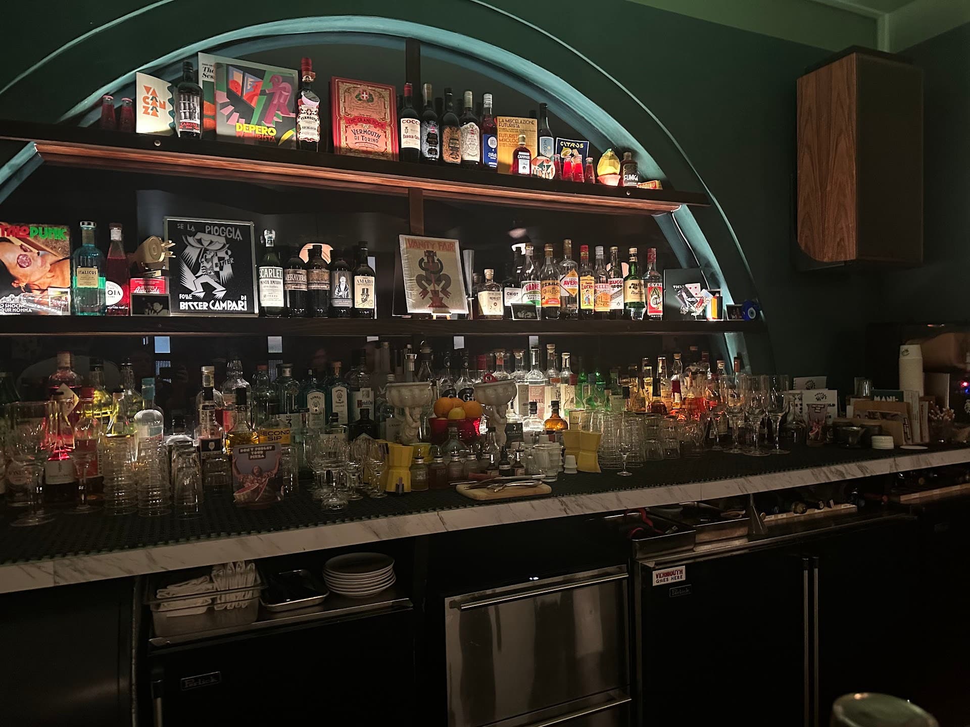 Bar area at ViceVersa Miami with various spirits