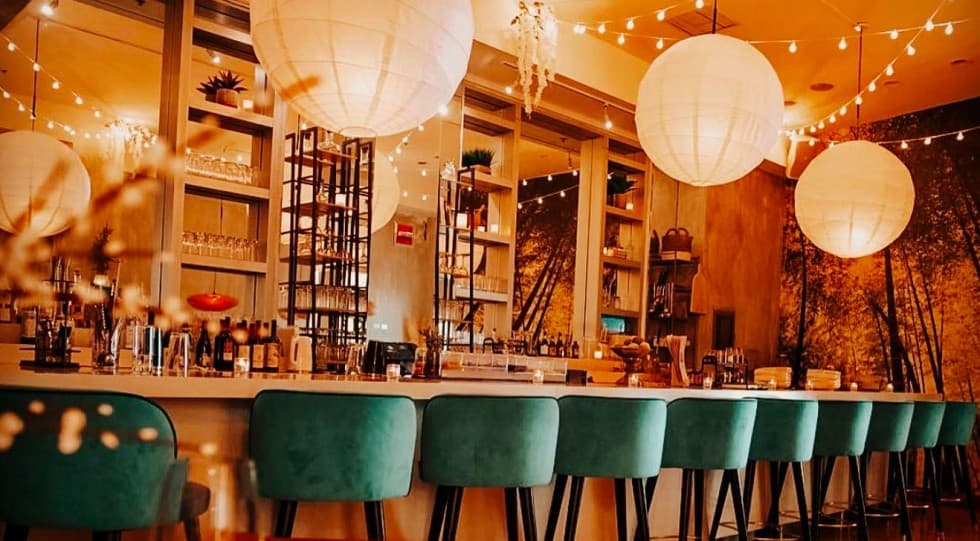 Stylish bar at WATER LION Wine + Alchemy, 1671 Collins Ave