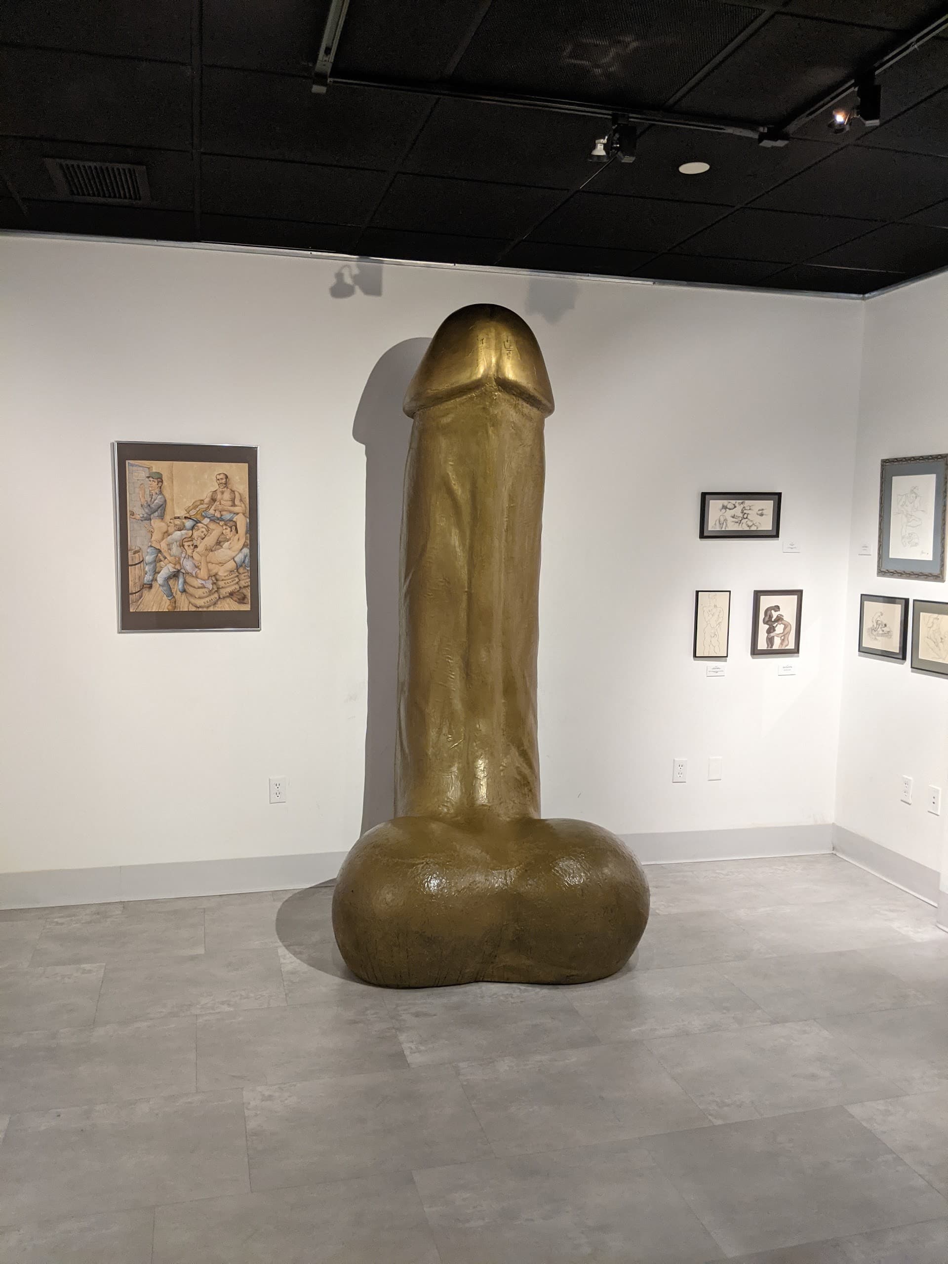 Large golden sculpture at World Erotic Art Museum in Miami Beach